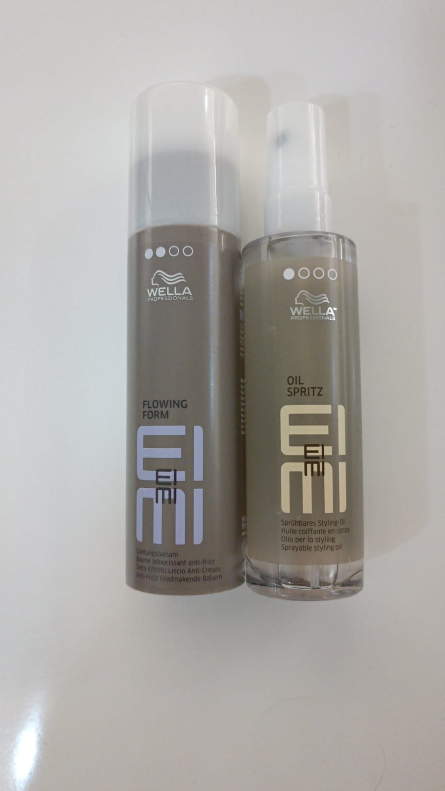 WELLA PROFESSIONAL Flowing Form Anti-Frizz Hair Balm 100 ml +WELLA PROFESSIONAL Spritz Sprayable  Styling Oil 95 ml - Aegean Vibe